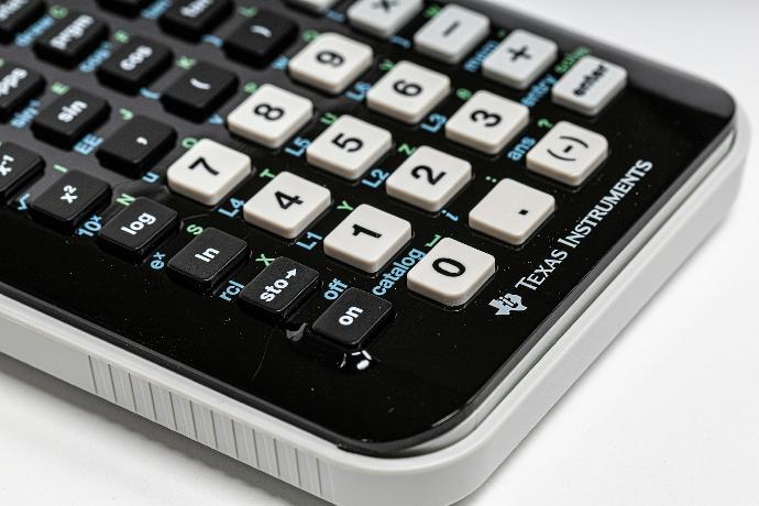 black and white Texas Instruments calculator